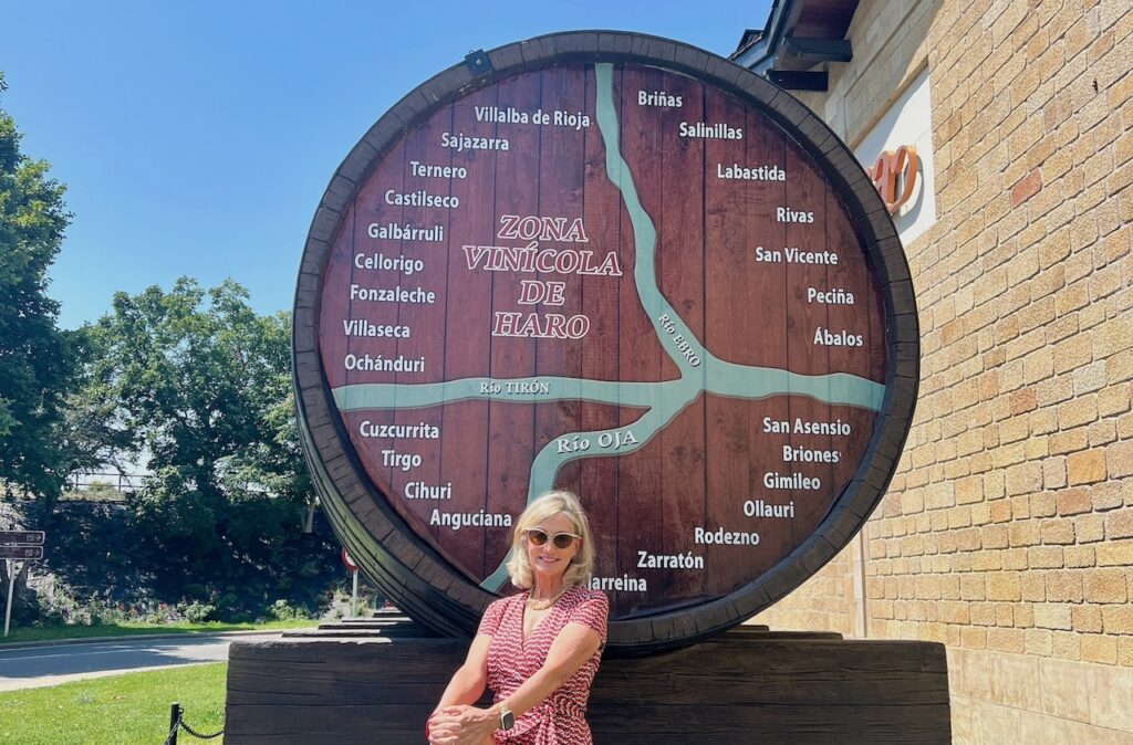 Photo of me, Joanne in front of a Haro winery, Rioja area Spain